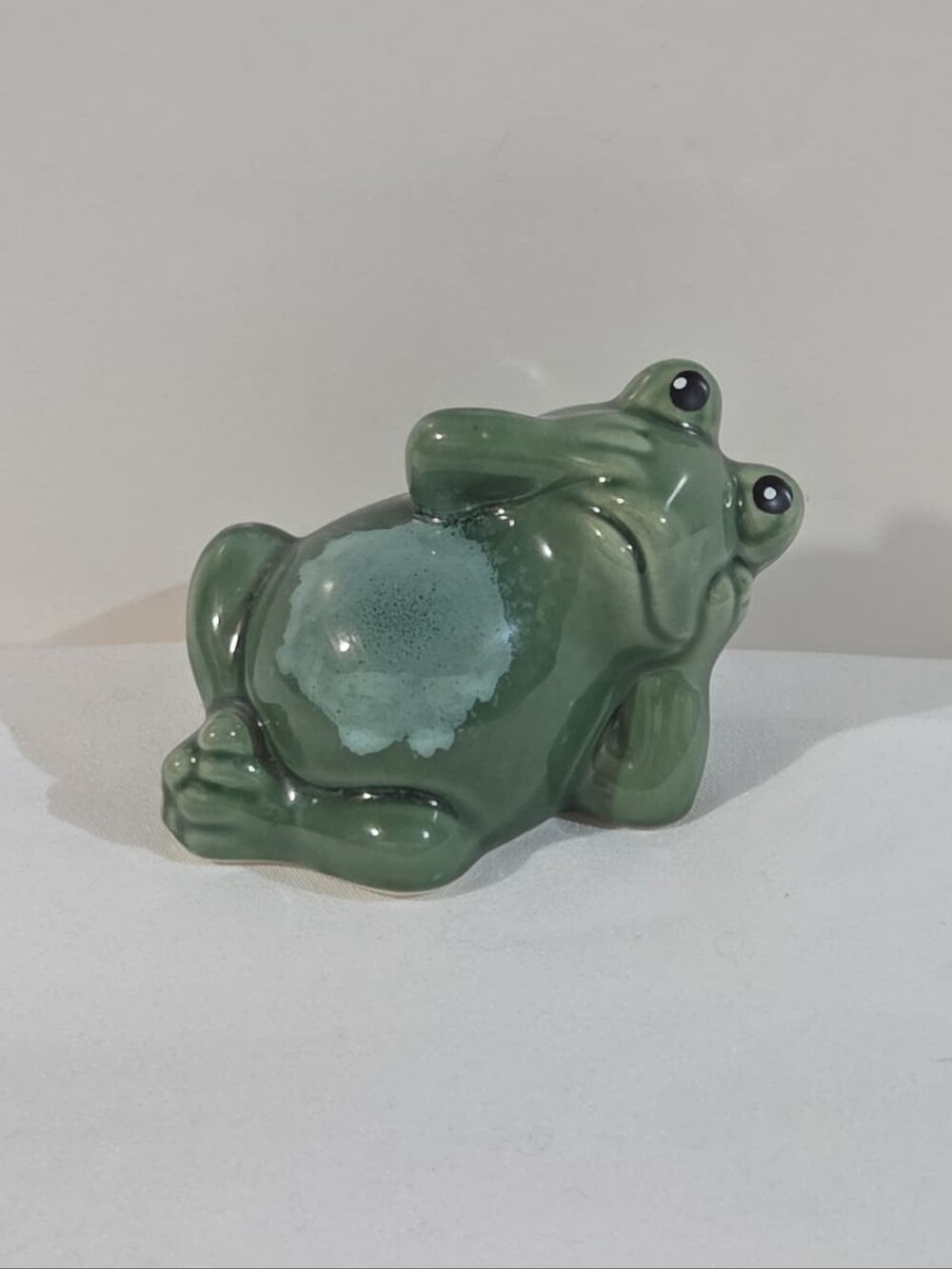 ceramic posing frog figurine